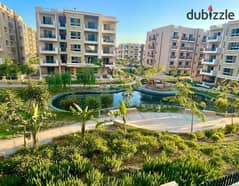 Luxurious Apartment for sale, 162 sqm + Private Garden with a very distinctive landscape view in front of Cairo International Airport, available on in