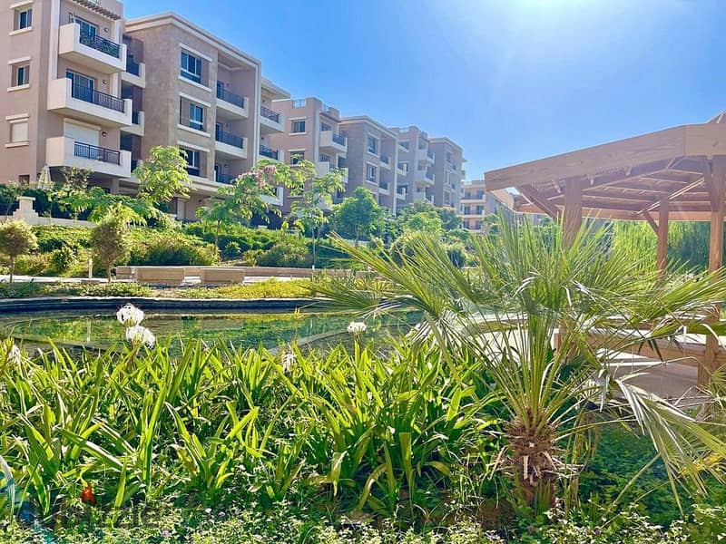 Luxurious Apartment for sale, 162 sqm + Private Garden with a very distinctive landscape view in front of Cairo International Airport, available on in 3