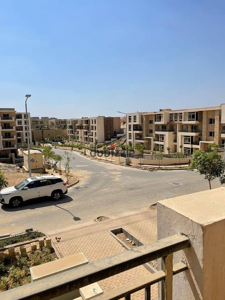 Luxurious Apartment for sale, 162 sqm + Private Garden with a very distinctive landscape view in front of Cairo International Airport, available on in 4