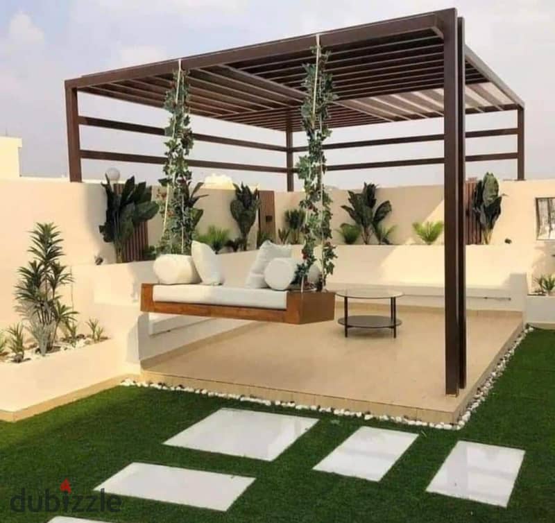 Luxurious Apartment for sale, 162 sqm + Private Garden with a very distinctive landscape view in front of Cairo International Airport, available on in 8