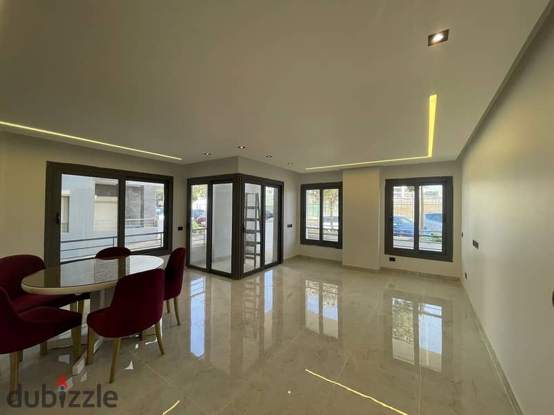 Luxurious Apartment for sale, 162 sqm + Private Garden with a very distinctive landscape view in front of Cairo International Airport, available on in 9