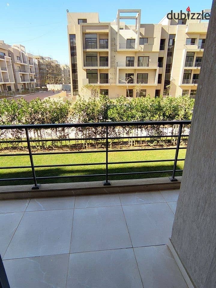 Luxurious Apartment for sale, 162 sqm + Private Garden with a very distinctive landscape view in front of Cairo International Airport, available on in 10