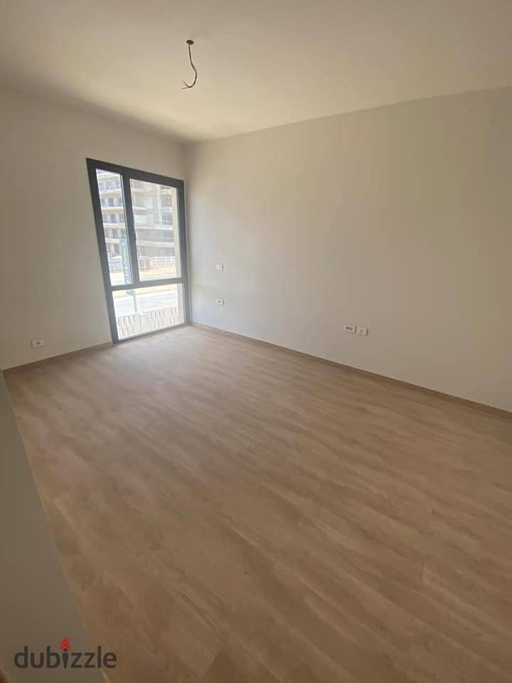 A fully finished two-room apartment for sale in Shorouk City, in front of the International Medical Center in AL Burouj Compound 5