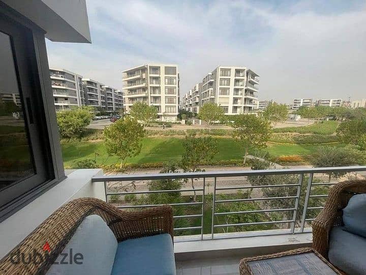 Luxurious Apartment for sale, 159 sqm + Private Garden with a very distinctive landscape view in front of Cairo International Airport, available on in 9