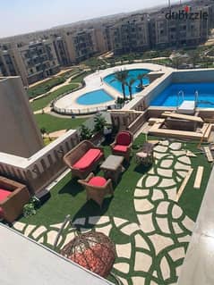 penthouse with private roof 132m ready to live  for sale with the lowest down payment next to auc 0