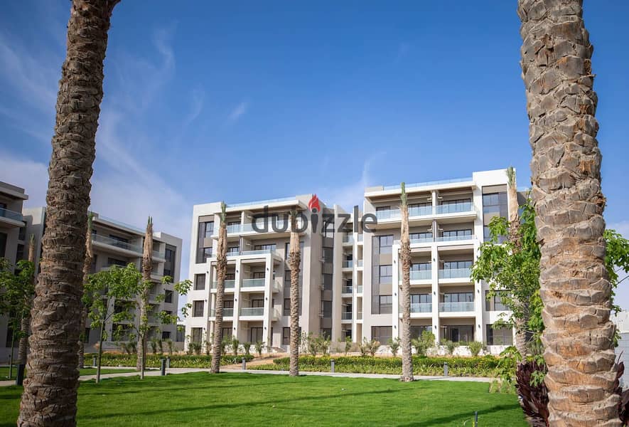 Apartment with garden for sale, immediate receipt, fully finished, in the Fifth Settlement, next to Palm Hills, in The Address East Compound 1