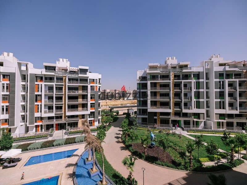 Apartment for sale in Fifth Settlement, Golden Square Icon Compound with only 15% down payment A distinctive view of the landscape 15