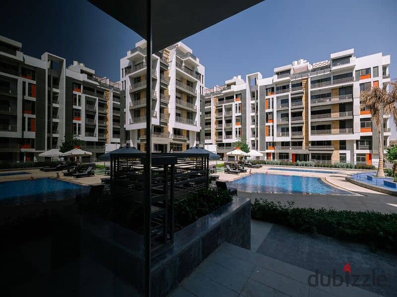 Apartment for sale in Fifth Settlement, Golden Square Icon Compound with only 15% down payment A distinctive view of the landscape 19