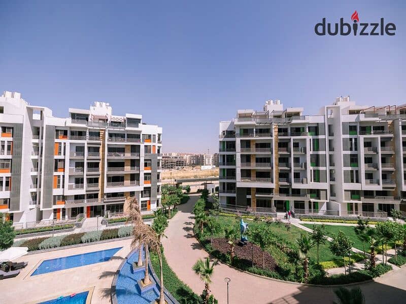 Apartment for sale in Fifth Settlement, Golden Square Icon Compound with only 15% down payment A distinctive view of the landscape 21