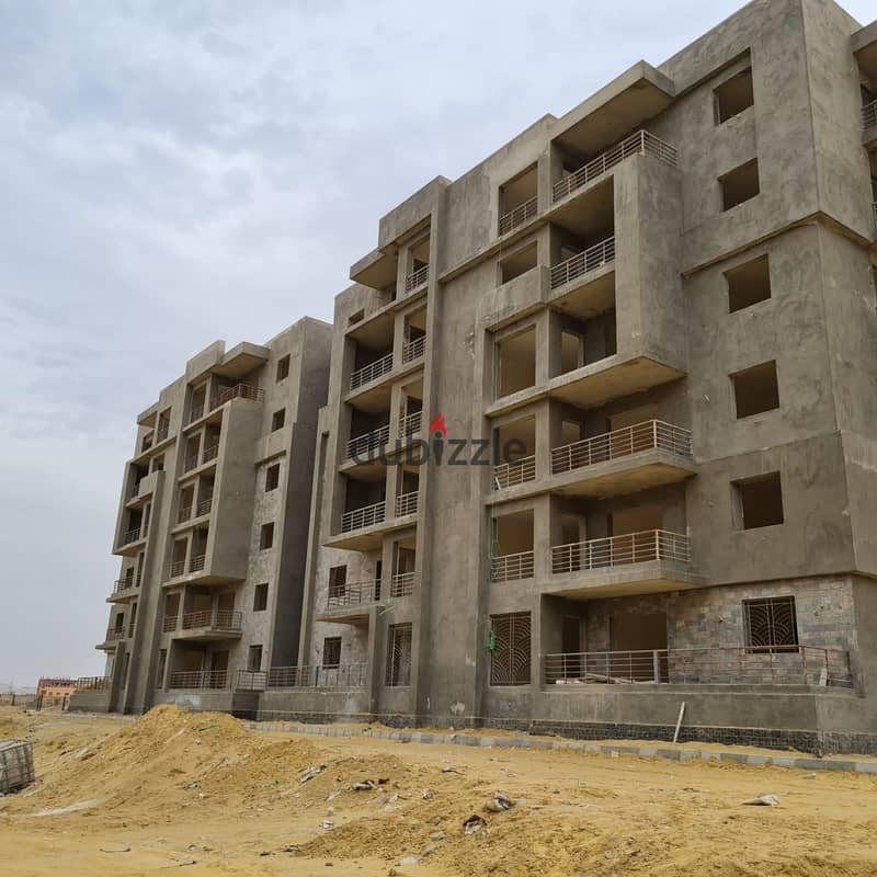 For sale, a 150-square-meter apartment with a fully finished garden, in installments, to be delivered in one year, Bliss Gate, next to Village West Za 4