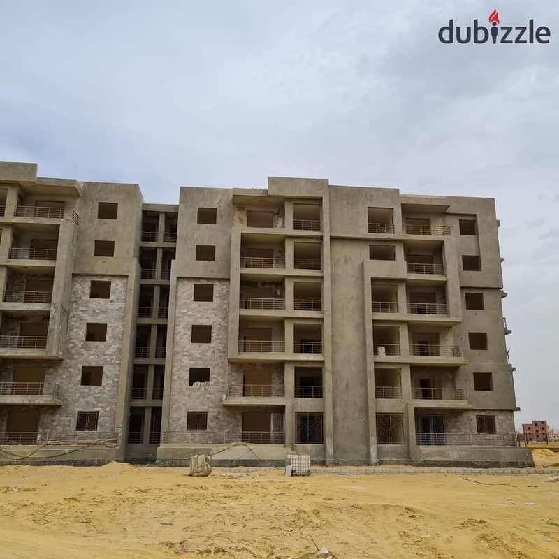 For sale, a 150-square-meter apartment with a fully finished garden, in installments, to be delivered in one year, Bliss Gate, next to Village West Za 5