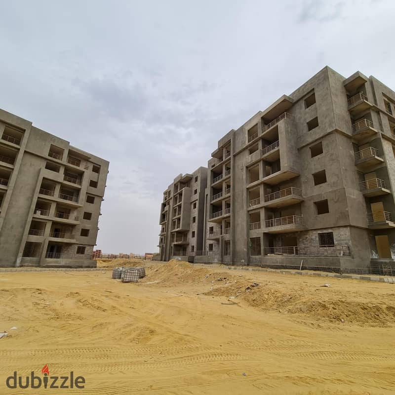 For sale, a 150-square-meter apartment with a fully finished garden, in installments, to be delivered in one year, Bliss Gate, next to Village West Za 7