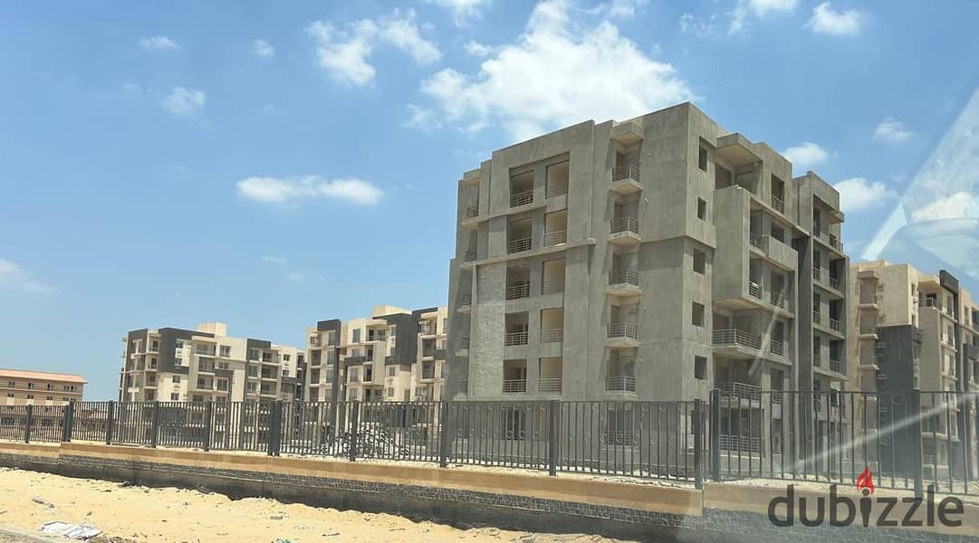 For sale, a 150-square-meter apartment with a fully finished garden, in installments, to be delivered in one year, Bliss Gate, next to Village West Za 8