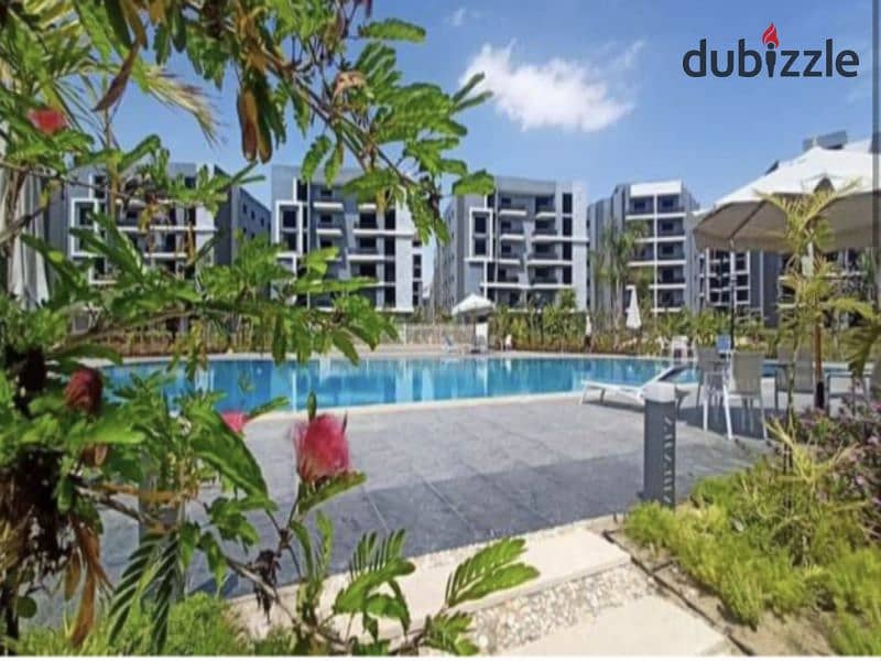 With only 10% down payment, an apartment with a garden, Ready To Move , in Sun Capital Compound in the heart of October | View on the landscape 0