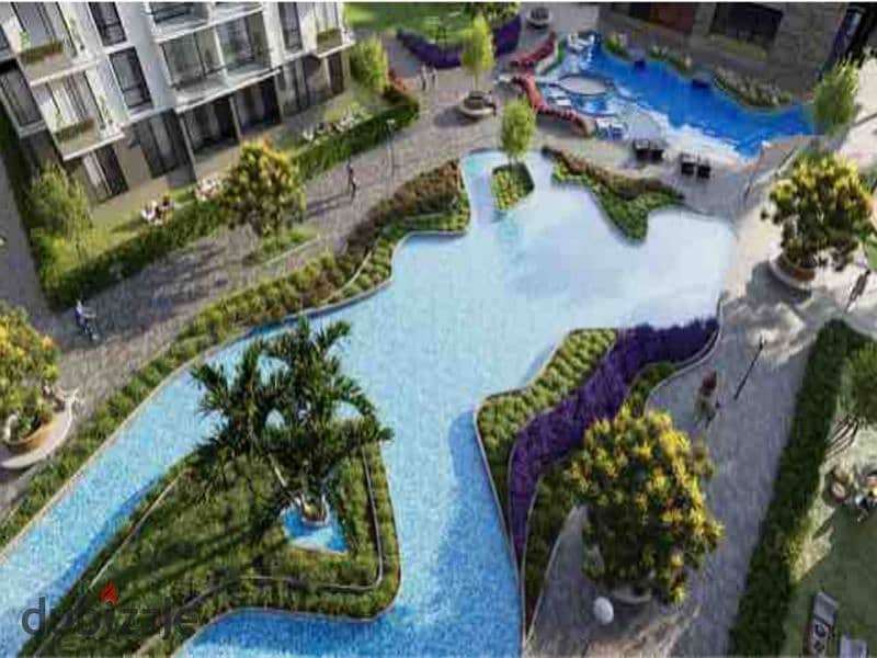 Two-bedroom apartment for sale in Golden Square in icon Compound with only 15% down payment | View on the landscape 5