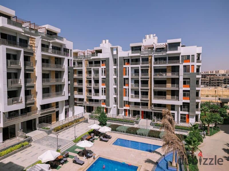 Two-bedroom apartment for sale in Golden Square in icon Compound with only 15% down payment | View on the landscape 16