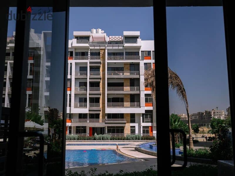 شقه غرفتين  للبيع في الجولدن سكوير في كمبوند ايكون بمقدم 15% فقط | فيو علي اللاند سكيب  * Icon Gardens * 21