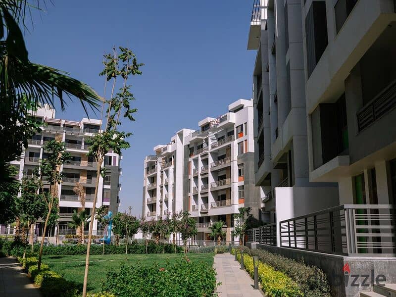 Two-bedroom apartment for sale in Golden Square in icon Compound with only 15% down payment | View on the landscape 22