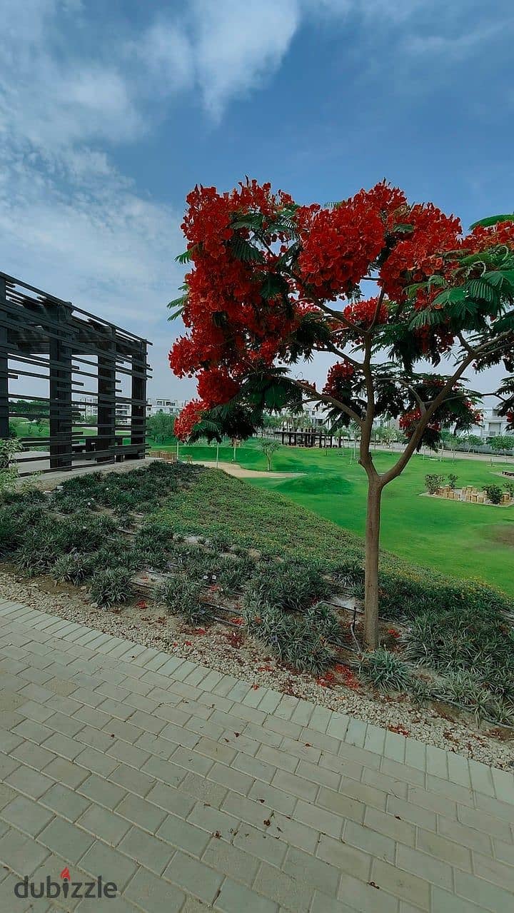 An apartment with a garden in a 1,000-acre compound with full services, in a special location in front of Cairo Airport, near Nasr City, Taj City. 3