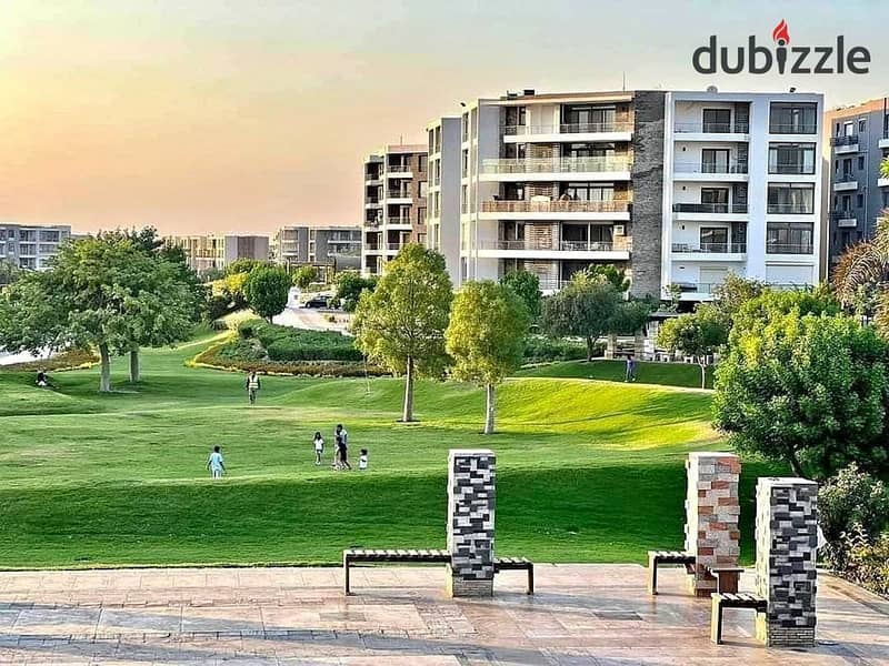 An apartment with a garden in a 1,000-acre compound with full services, in a special location in front of Cairo Airport, near Nasr City, Taj City. 11