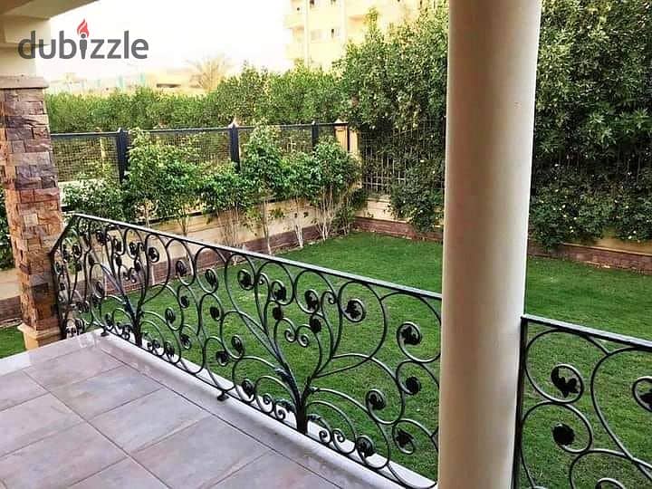 An apartment with a garden in a 1,000-acre compound with full services, in a special location in front of Cairo Airport, near Nasr City, Taj City. 12