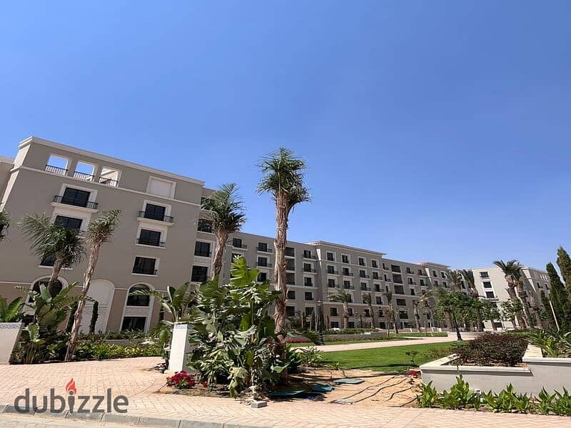 Apartment for sale, ground floor, garden Fully finished in the heart of New Zayed with Dorra Village West Special cash discount Village West 20