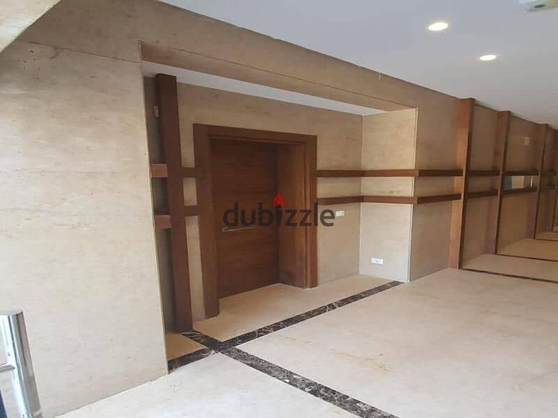 Apartment for sale in a garden in the heart of Golden Square, with a 5% down payment and equal installments, in Trio Gardens with M Square | With a 40 12