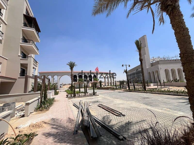 Apartment for sale in a private garden with the real estate developer Dorra, fully finished, in the heart of New Zayed in the Village West Compound 4