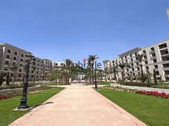 Apartment for sale in a private garden, fully finished, with the real estate developer, Dorra, in the heart of New Zayed, in the Village West Compound