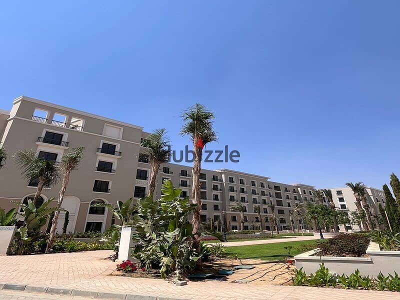 Fully finished apartment for sale with real estate developer Dorra in the heart of New Zayed in Village West Compound Special cash discount Village We 4