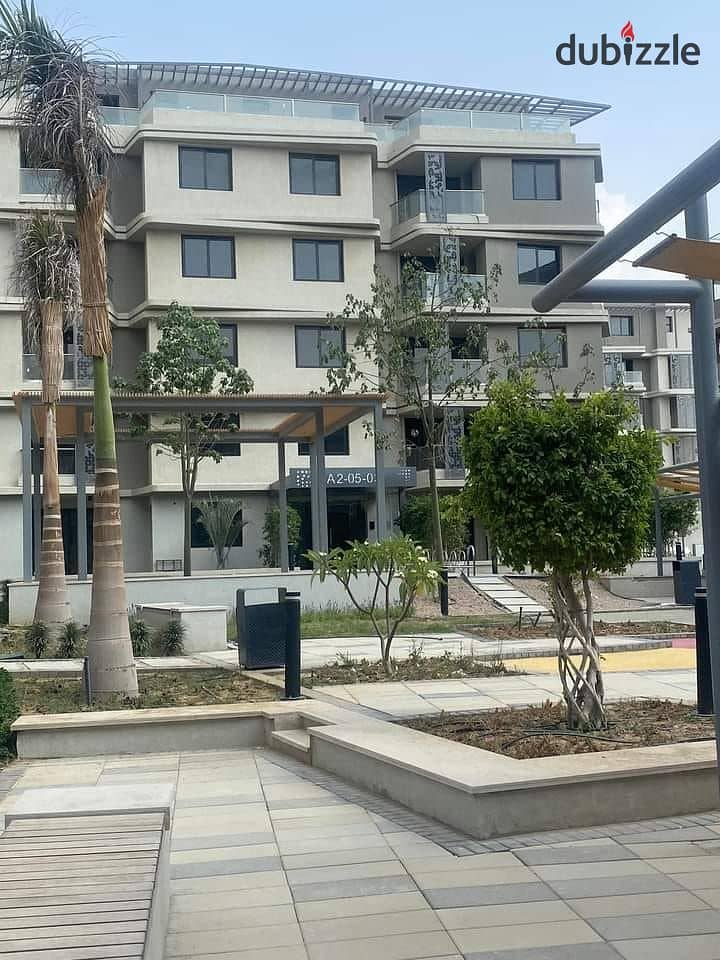 An apartment with high-end finishes in the Badia compound by Palm Hills,Yassin Mansour. It is the first smart compound in October, located near MSA 7