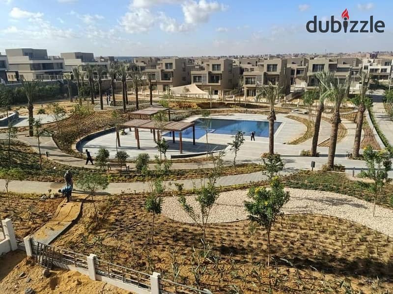 An apartment with high-end finishes in the Badia compound by Palm Hills,Yassin Mansour. It is the first smart compound in October, located near MSA 9