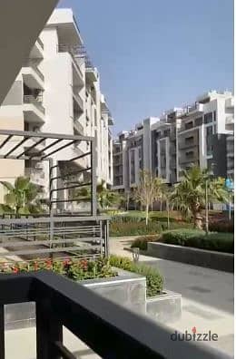 Own an apartment in Garden City in the Fifth Settlement with a 30% cash discount in Golden Square - Icon Gardens Compound _ 15% down payment 2