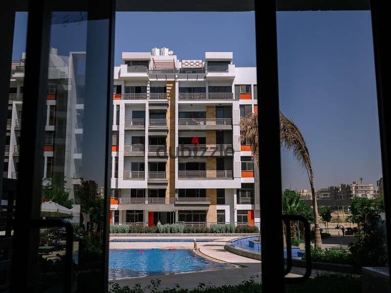 Apartment for sale in the Fifth Settlement with a 30% cash discount in Golden Square - Icon Gardens Compound | 15% down payment * Icon Gardens * 4