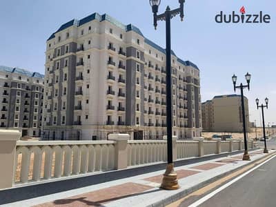 Apartment For Sale Ready To Move in Latin District North Coast | شقة للبيع أستلام فوري فيو بحري في الحي اللاتيني العلمين