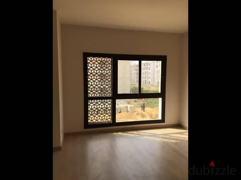 Apartment with garden for living in Address East, Fifth Settlement, fully finished and immediate receipt, next to Mountain View iCity and Palm Hills, 6