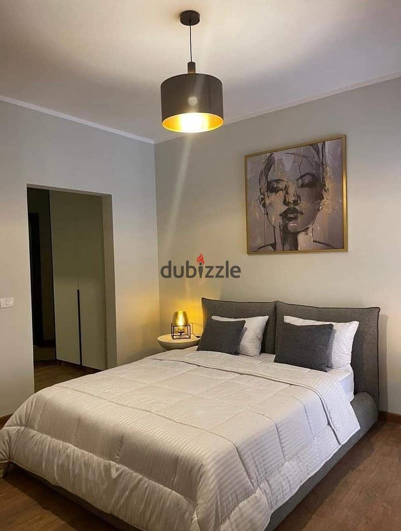 A snapshot apartment for sale, finished, with air conditioners, at the lowest price and down payment, in the heart of the old city of Sheikh Zayed 2