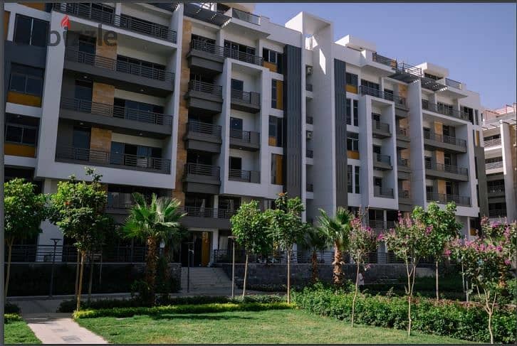 With a 30% cash discount, an apartment for sale in the Fifth Settlement in Golden Square - Icon Gardens Compound | 15% down payment * Icon Gardens * 0