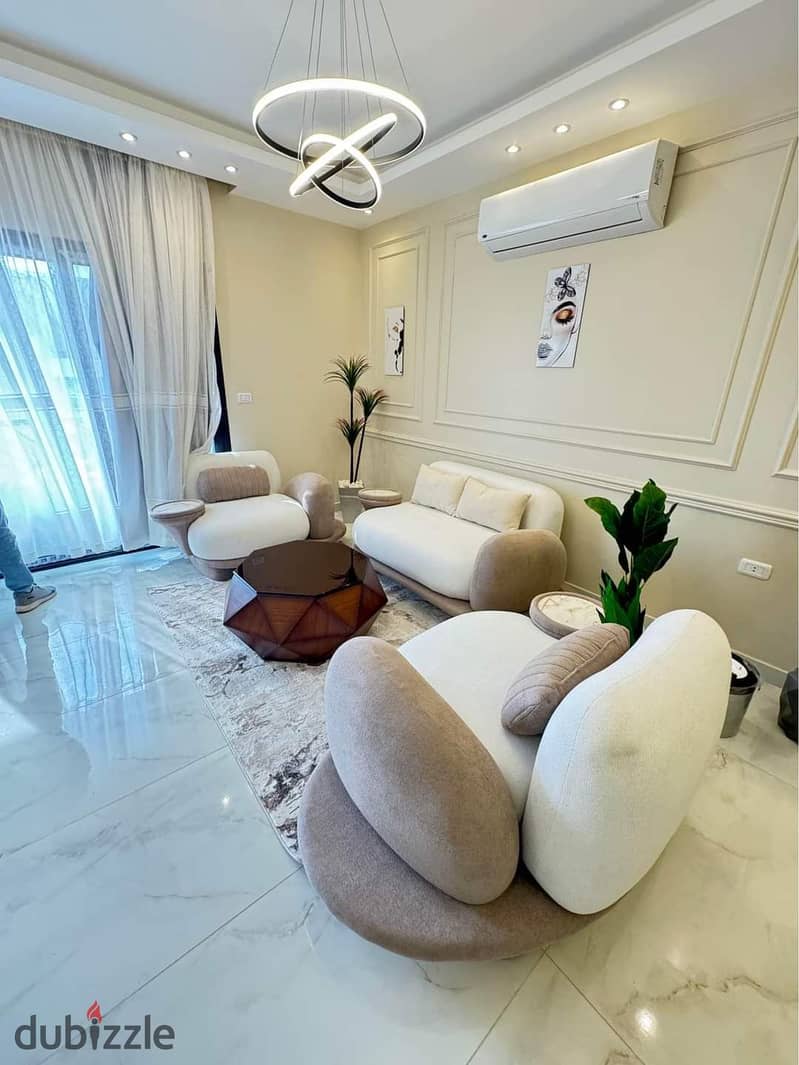 For a quick sale, I own a fully finished apartment at the price of the past in the most prestigious compound in the heart of old Sheikh Zayed, in fron 1