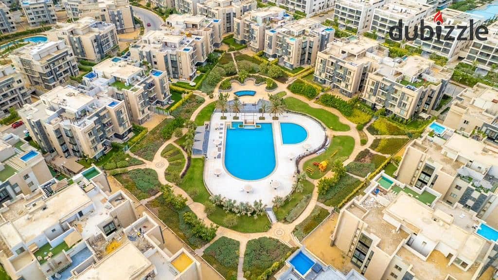 Own apartment in equal installments ready to move with garden 100-m. in the heart of the Fifth Settlement_fully finished_37% cash discount in Galleria 5