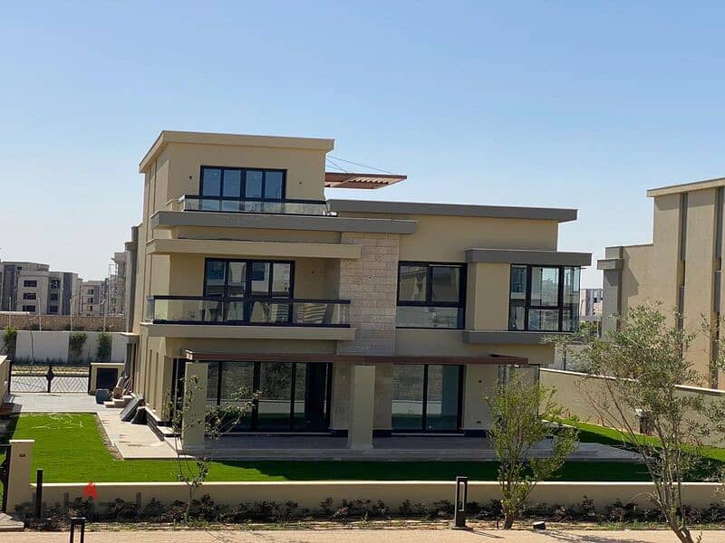 Corner villa for sale in New Cairo in Tag City, a very special location in front of Cairo International Airport 5