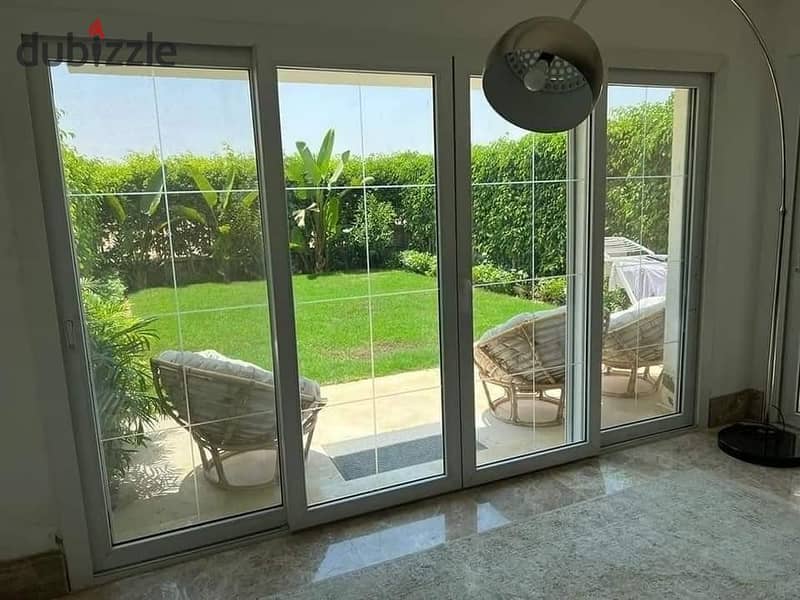 Twin house villa ready to move, double view in front of Madinaty, in La Vista Compound, El Patio Casa, distinctive location on Suez Road, installment 11