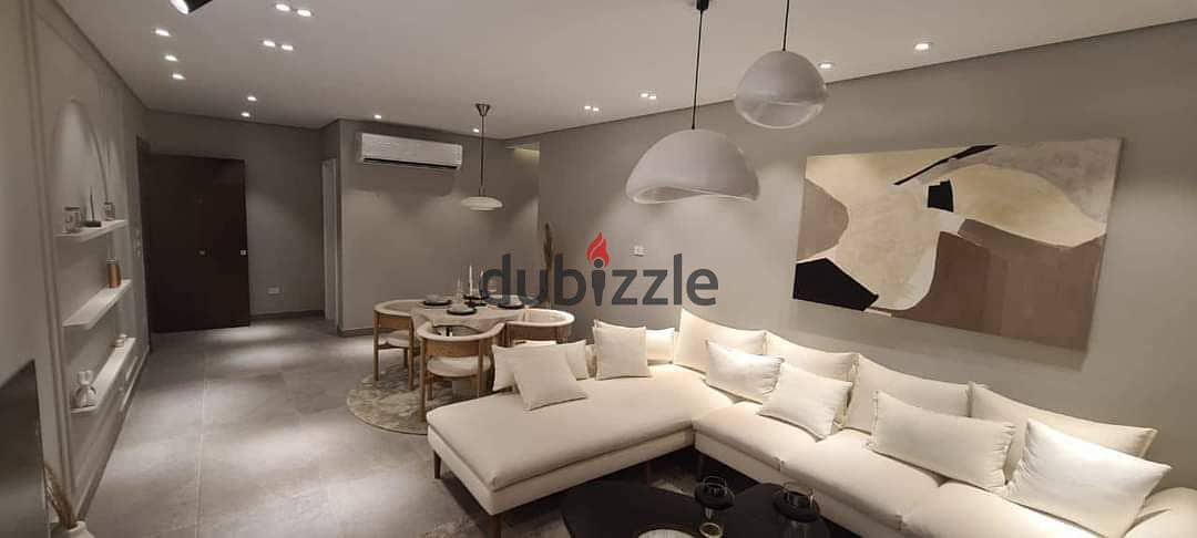 Directly from the owner, fully finished apartment with air conditioners at less than the company price in Dorra Village West Compound in the heart of 0