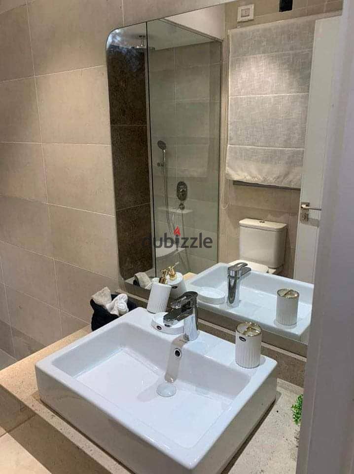 Directly from the owner, fully finished apartment with air conditioners at less than the company price in Dorra Village West Compound in the heart of 5