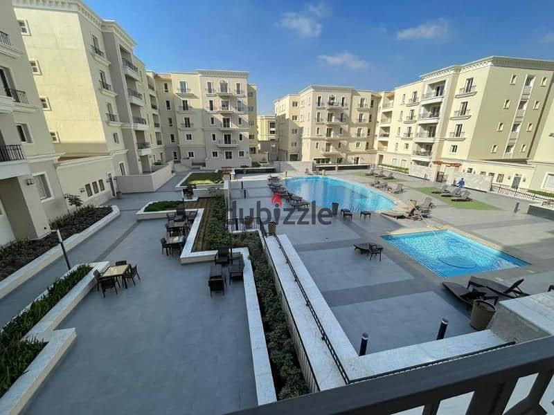 Apartment for rent in mivida boulevard Private pool 2parking 14