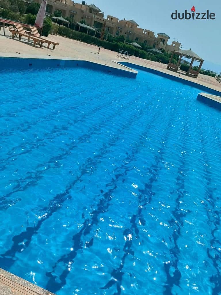 Chalet for immediate delivery, fully finished, for sale in installments in Ras Sudr, directly on the sea. Own a summer resort all year round + investm 15