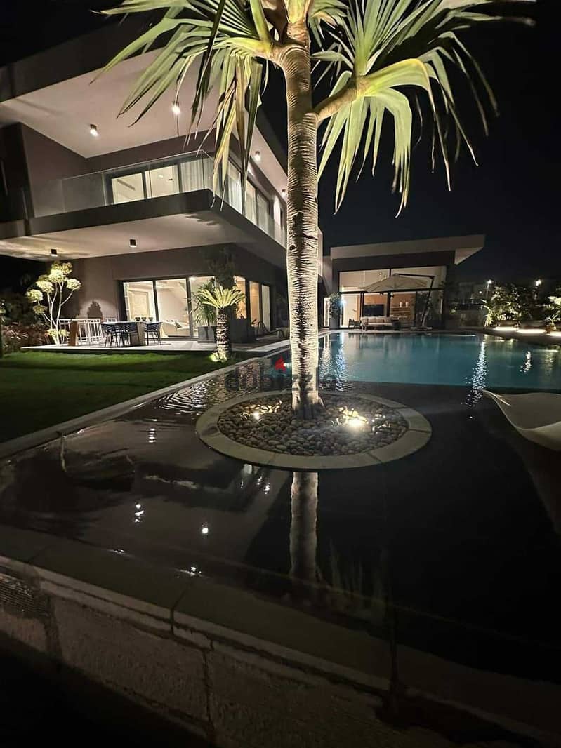 Townhouse villa for sale at the old price inside the Swan Lake West Compound in the heart of old Sheikh Zayed, in installments over 7 years with a 5% 5