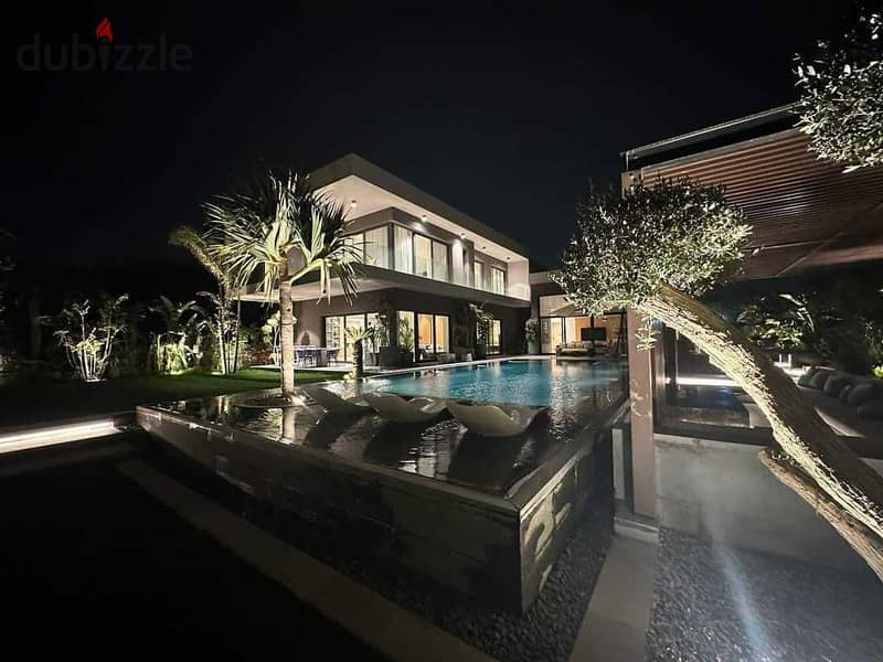 Townhouse villa for sale at the old price inside the Swan Lake West Compound in the heart of old Sheikh Zayed, in installments over 7 years with a 5% 7