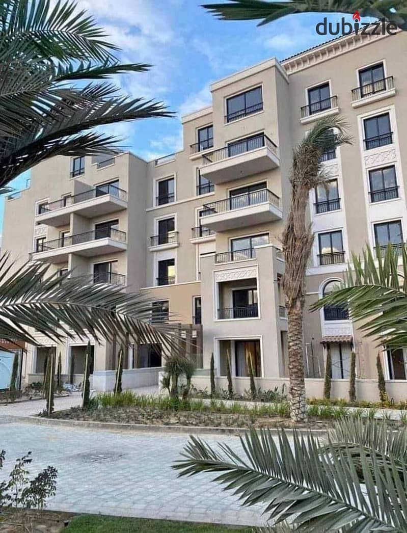 A snapshot apartment for sale, finished, with air conditioners, at a fantastic price, in Village West Compound, Sheikh Zayed, in installments over 5 y 6