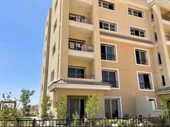 Apartment with a private garden for sale in the best location in front of Madinaty with a 10% down payment and installments